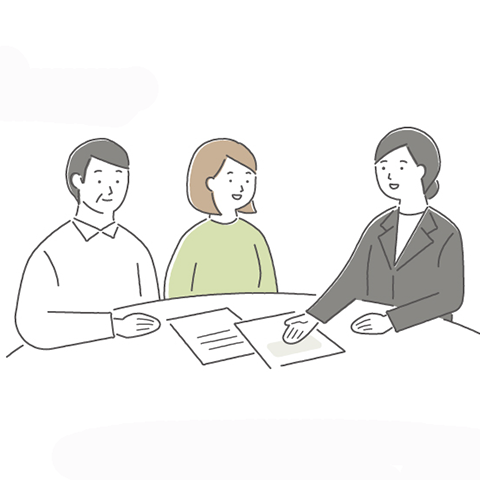 町田市家族葬 東横メモリアルが夫婦と相談者に葬儀の事前相談を案内しているシーン